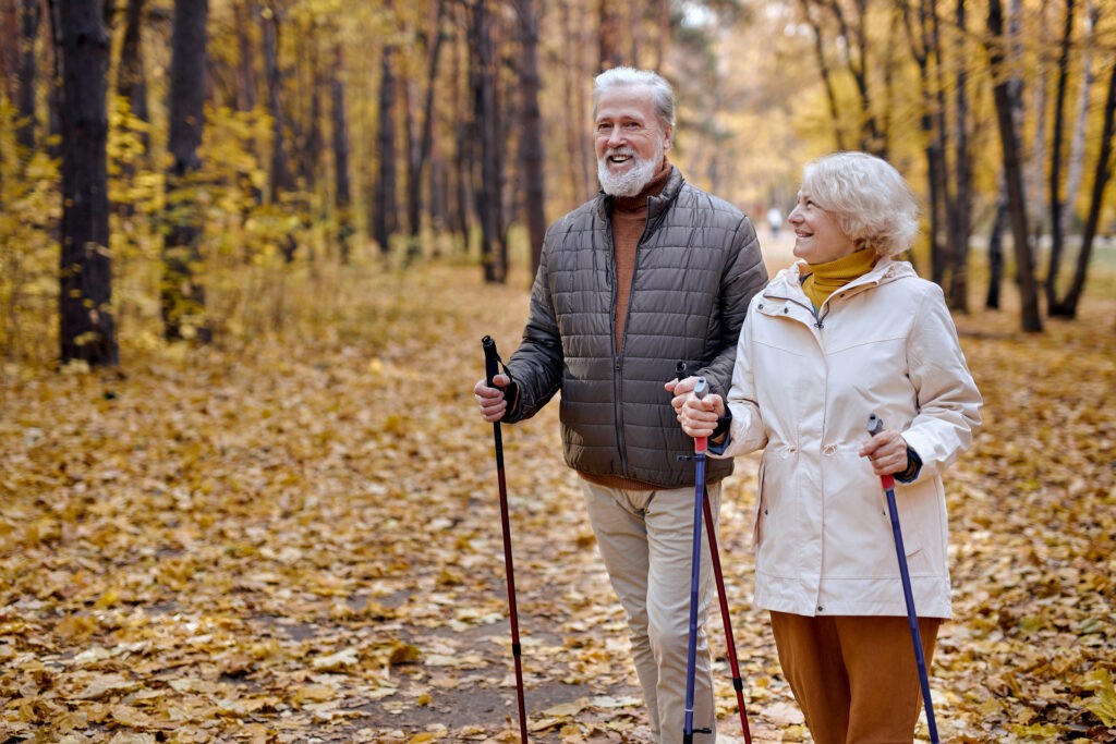 Two people hiking in the woods.